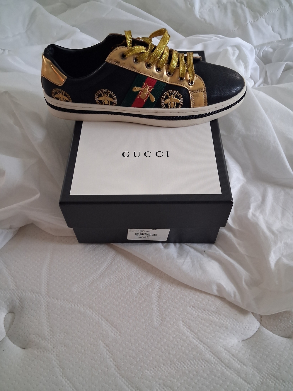 Gucci Black & Gold Low-Top Sneaker